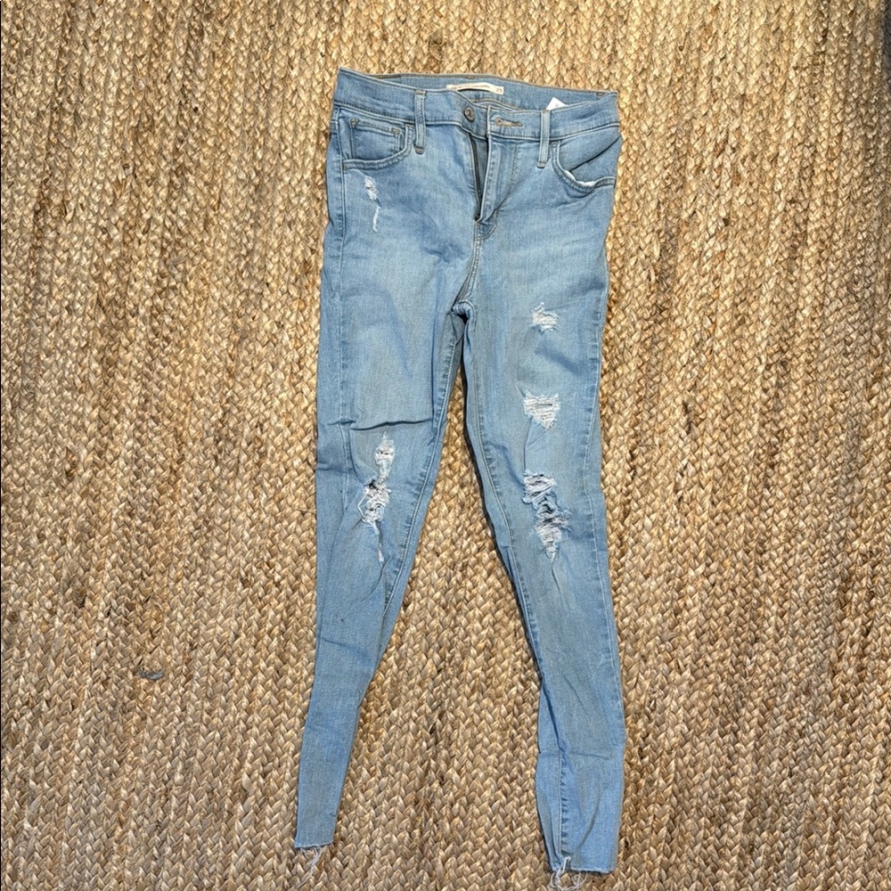 Stylish Light Blue Distressed Women's Levi Jeans